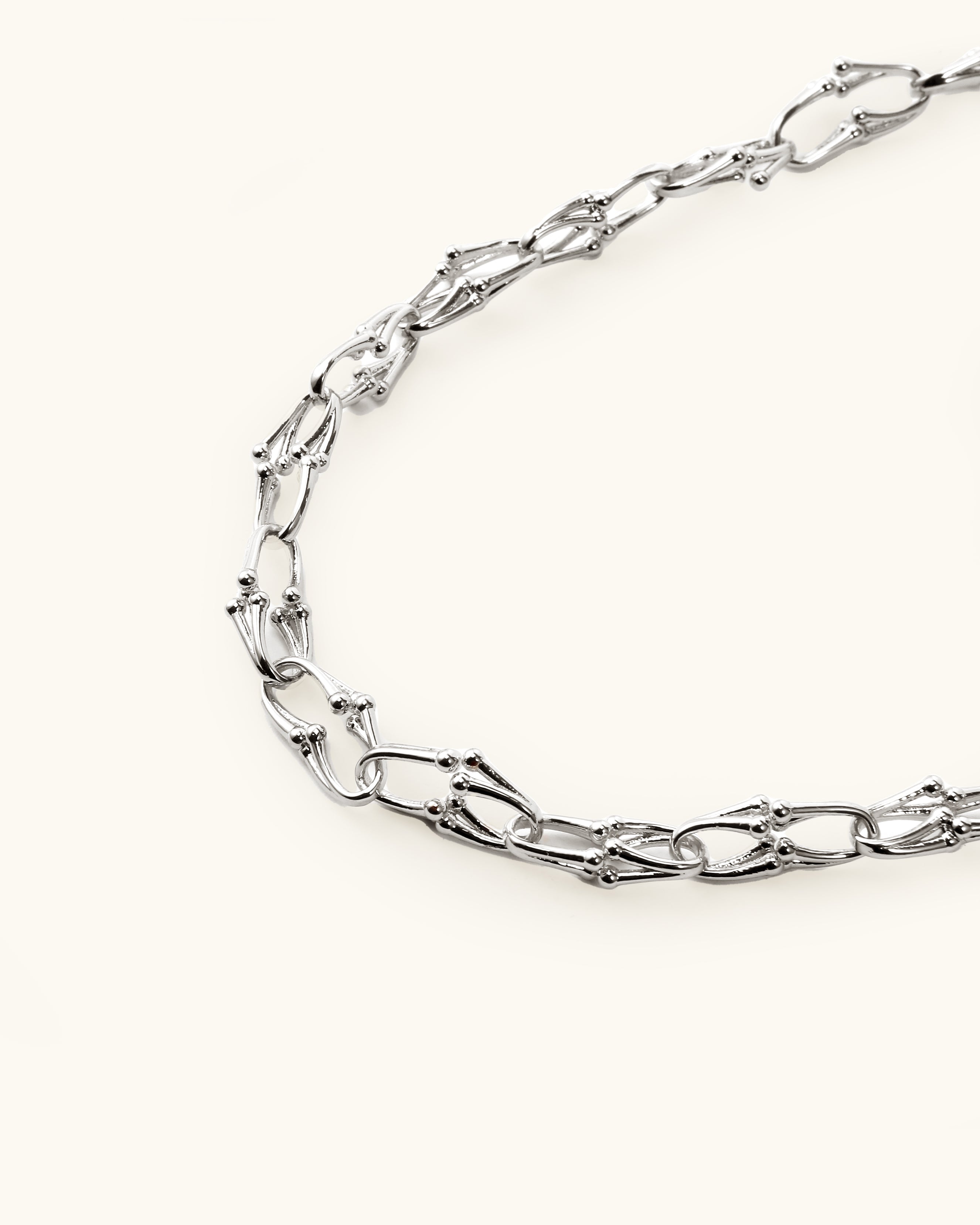 Floral Claw Necklace In Silver