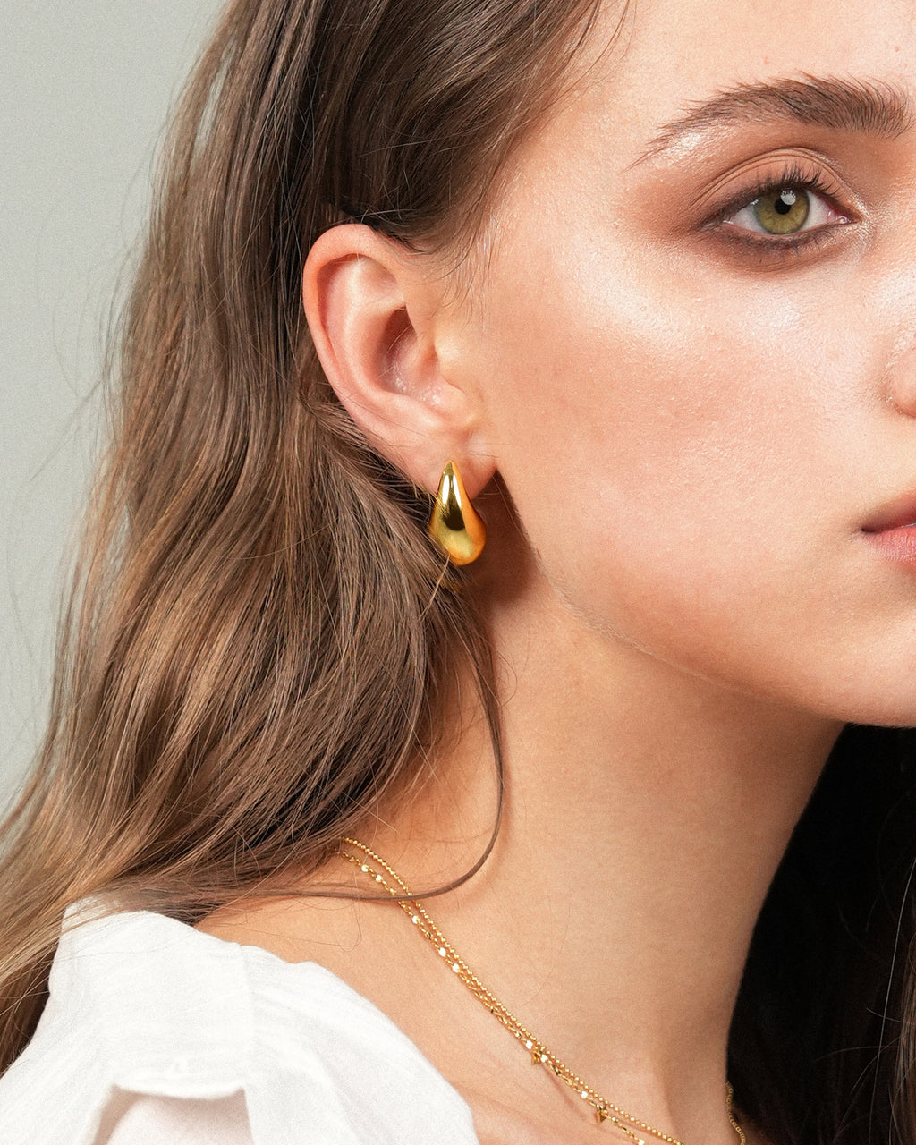 Small Teardrop Stud Earrings In Silver