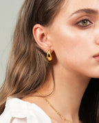 Small Teardrop Stud Earrings In Silver