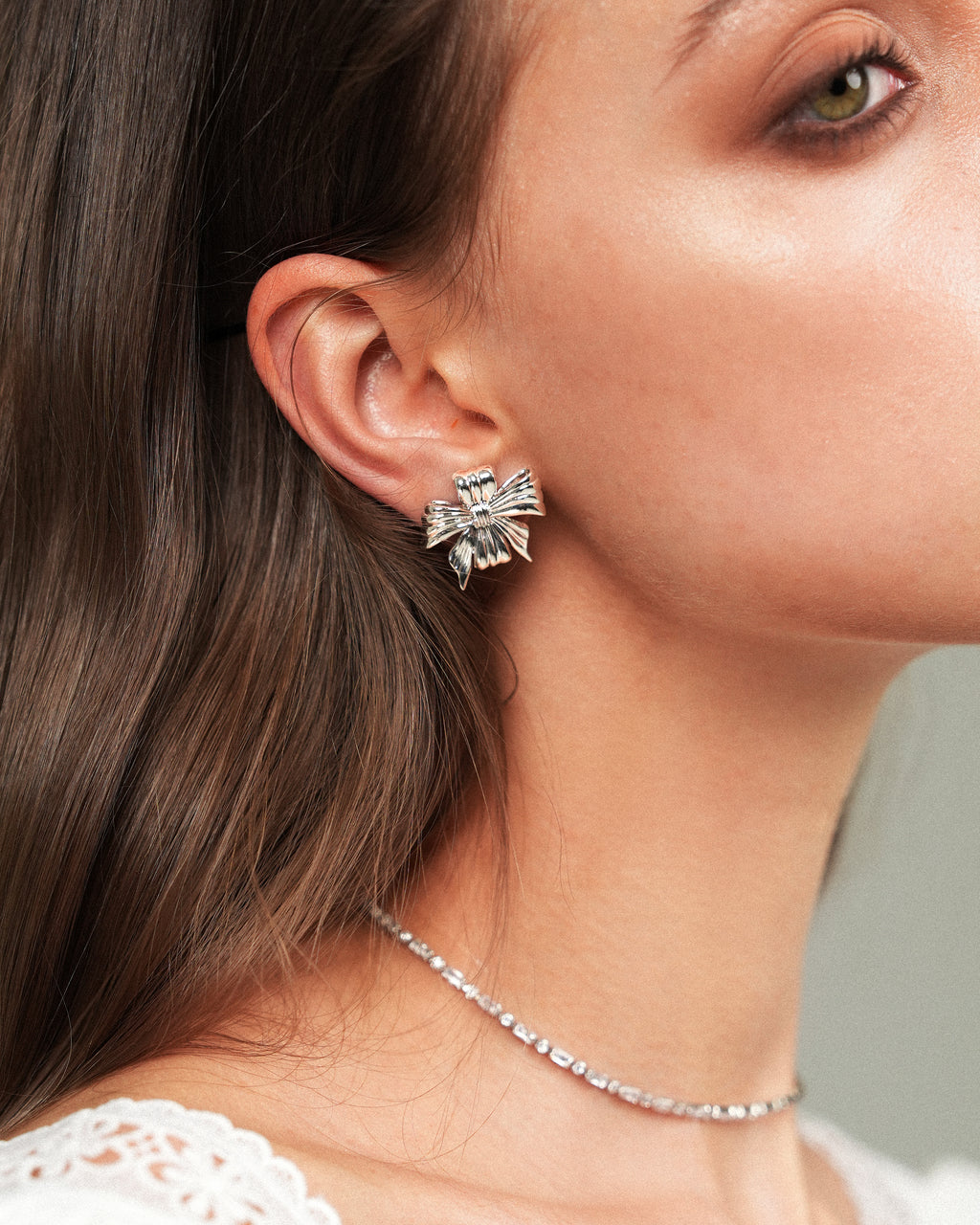 Asymmetric Bow Earrings In Silver