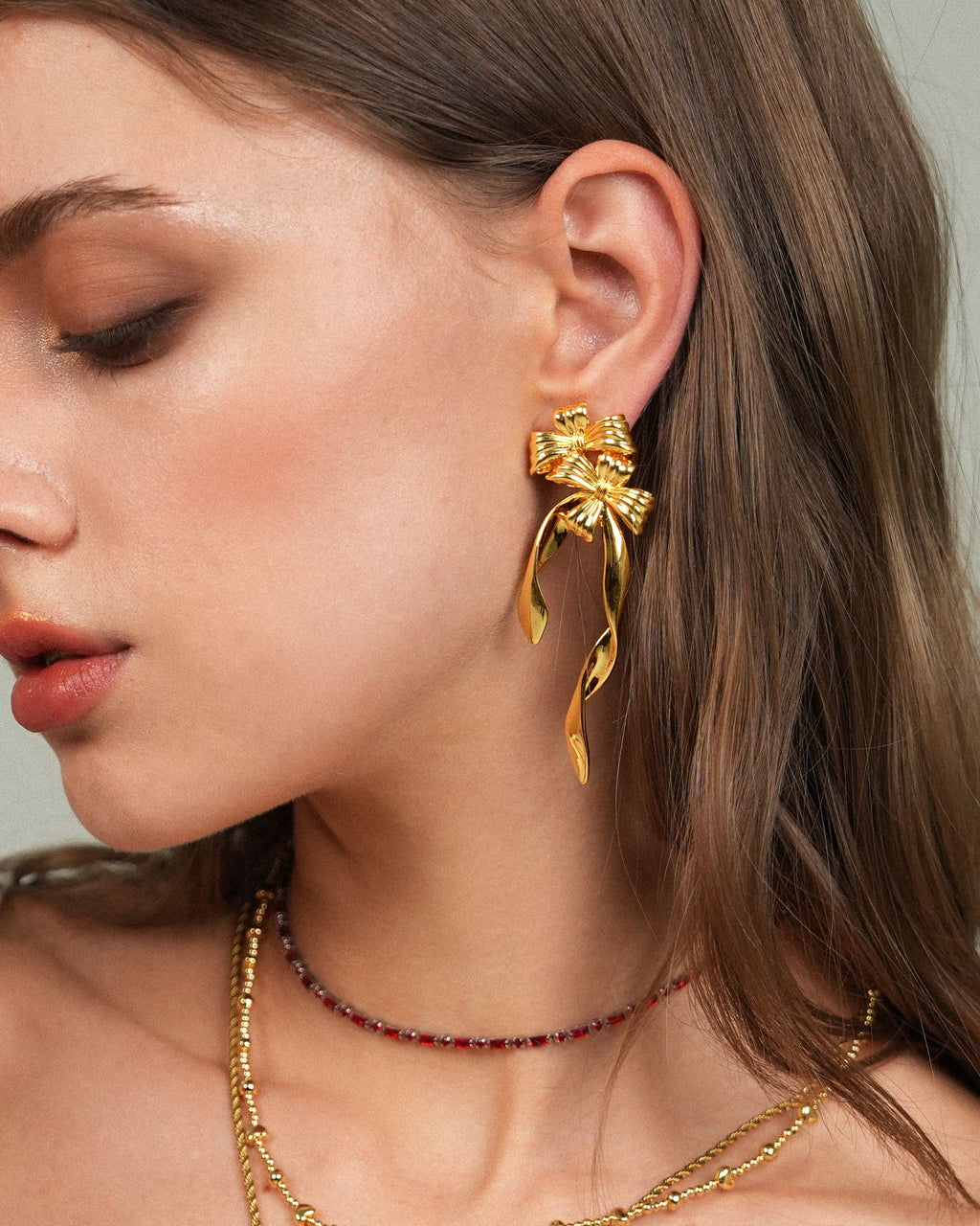 Asymmetric Bow Earrings In Silver