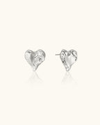 Carved Heart Earrings In Silver
